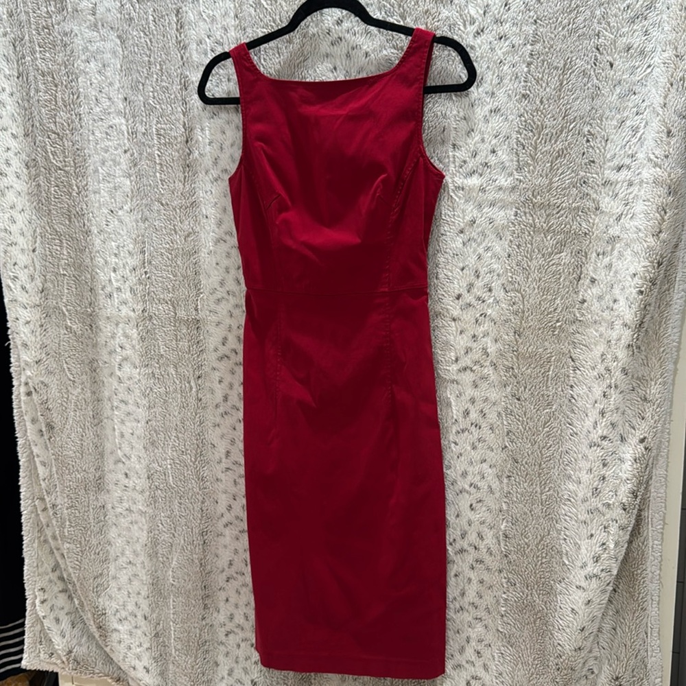 Red fitted dress.